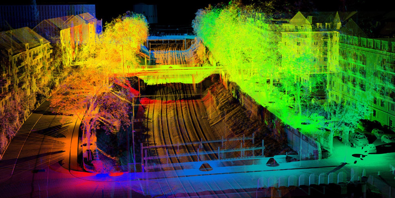 Today's Seebahngraben is the result of entrenching the rail spur in Wiedikon to solve congestion at ground level. The image shows a geometric survey recorded in 2023 with terrestrial laser scanning in which the positions are differentiated by color.